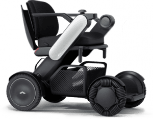 A modern, compact electric wheelchair with large wheels, a black frame, armrests, and a mesh storage basket underneath the seat. The design is sleek and innovative, suitable for enhanced mobility.