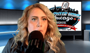 A woman with long blonde hair speaks into a microphone in a studio, with a Sweet Home Chicago sign and WGN Radio 720 logo displayed on a screen in the background.