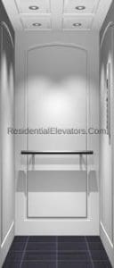 Interior view of a modern residential elevator with white paneled walls, recessed ceiling lights, a horizontal handrail, and dark checkered floor tiles.