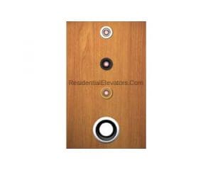 A vertical wooden panel with four round elevator call buttons arranged in a column. The buttons vary in size and color, with the largest at the bottom and the smallest at the top.