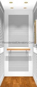 A modern, narrow elevator interior with horizontal metallic stripes on white walls, a wooden handrail, wooden floor, and recessed ceiling lights.