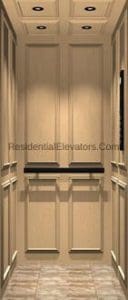 A small residential elevator interior with light wood paneling, recessed ceiling lights, a handrail, and a tiled floor.