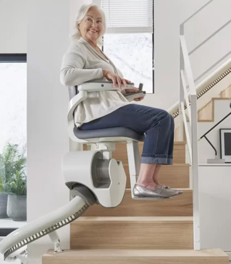 Access BDD Flow X Curved Stair Lift with Happy Rider