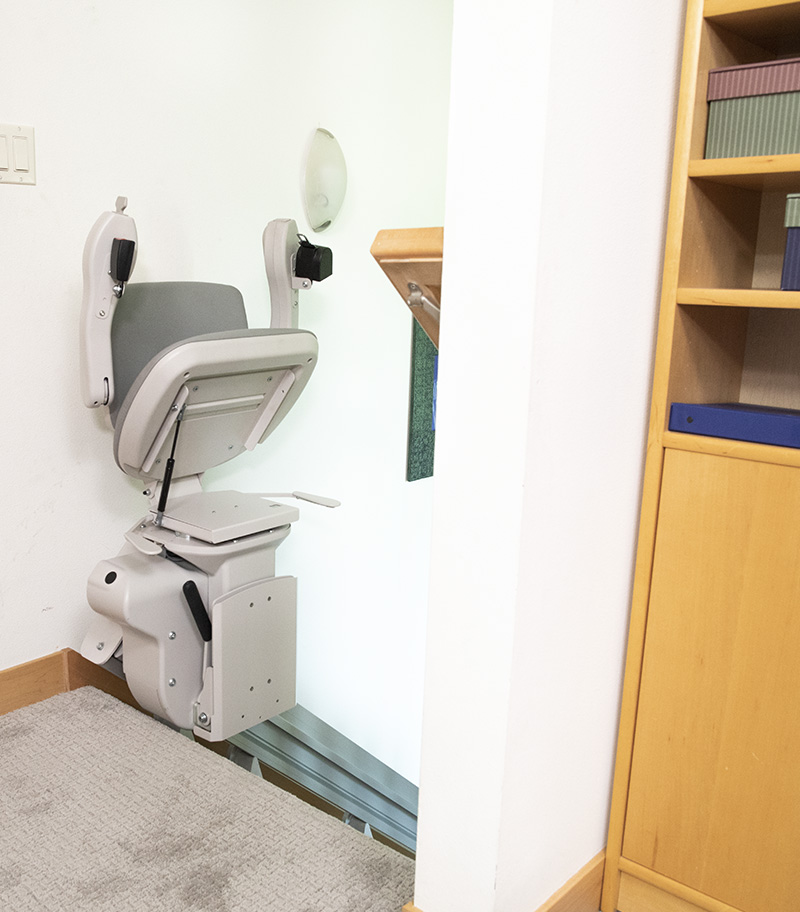Bruno Elite Bariatric Straight Stairlift In Folded Position at Top of Stairs
