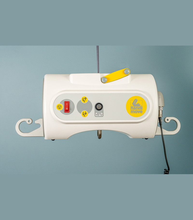SureHands portable ceiling lift with wired hand control – front view