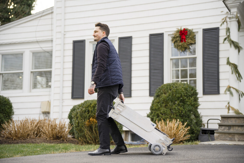 Wheeled folding aluminum portable ramp from National Ramps allows for exceptionally easy transportation