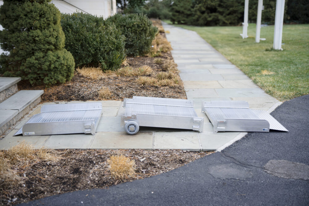 Individual sections of three fold portable wheelchair ramp can be separated for exceptional ease of transport