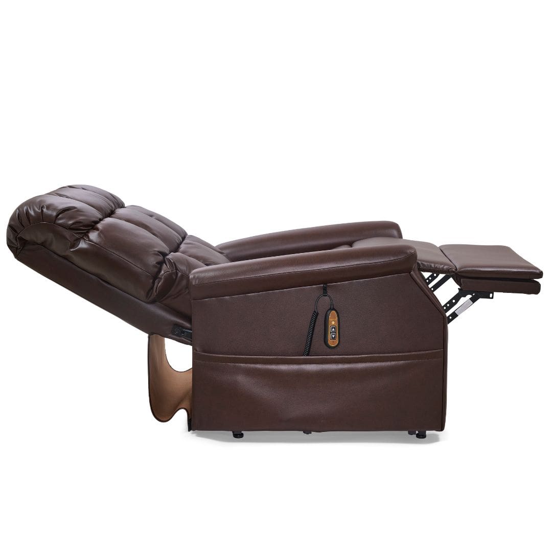A brown Cambridge Large - Lift Chair by Golden Technologies is shown fully reclined with the footrest extended and a remote control attached to its side pocket. A brown Cambridge Large - Lift Chair by Golden Technologies is shown fully reclined with the footrest extended and a remote control attached to its side pocket.