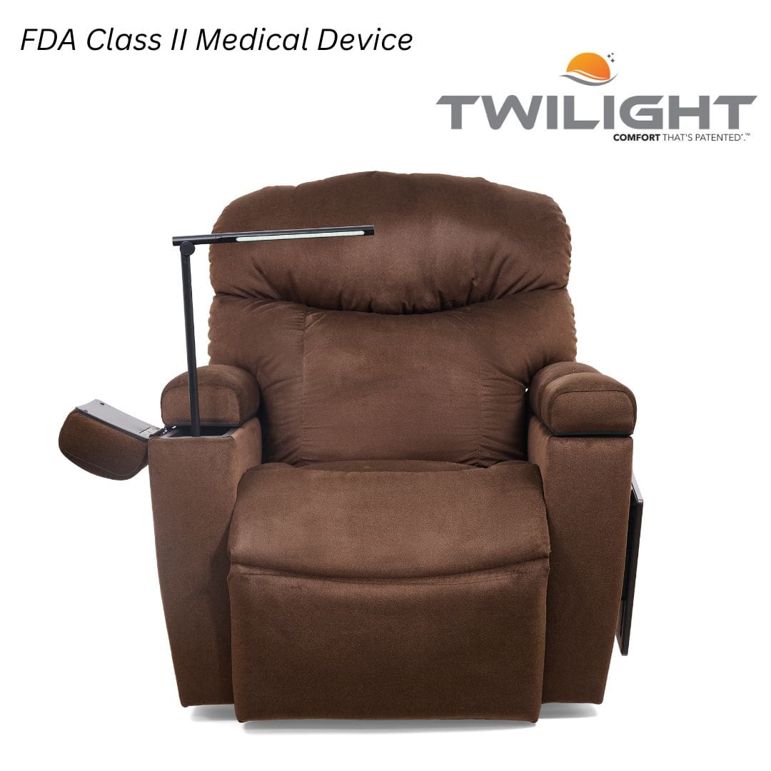 The Cloud+ Small with Twilight Lift Chair by Golden Technologies is a plush brown recliner labeled as an FDA Class II Medical Device, featuring an attached reading lamp and side table. The Twilight logo appears in the top right corner. The Cloud+ Small with Twilight Lift Chair by Golden Technologies is a plush brown recliner labeled as an FDA Class II Medical Device, featuring an attached reading lamp and side table. The Twilight logo appears in the top right corner.