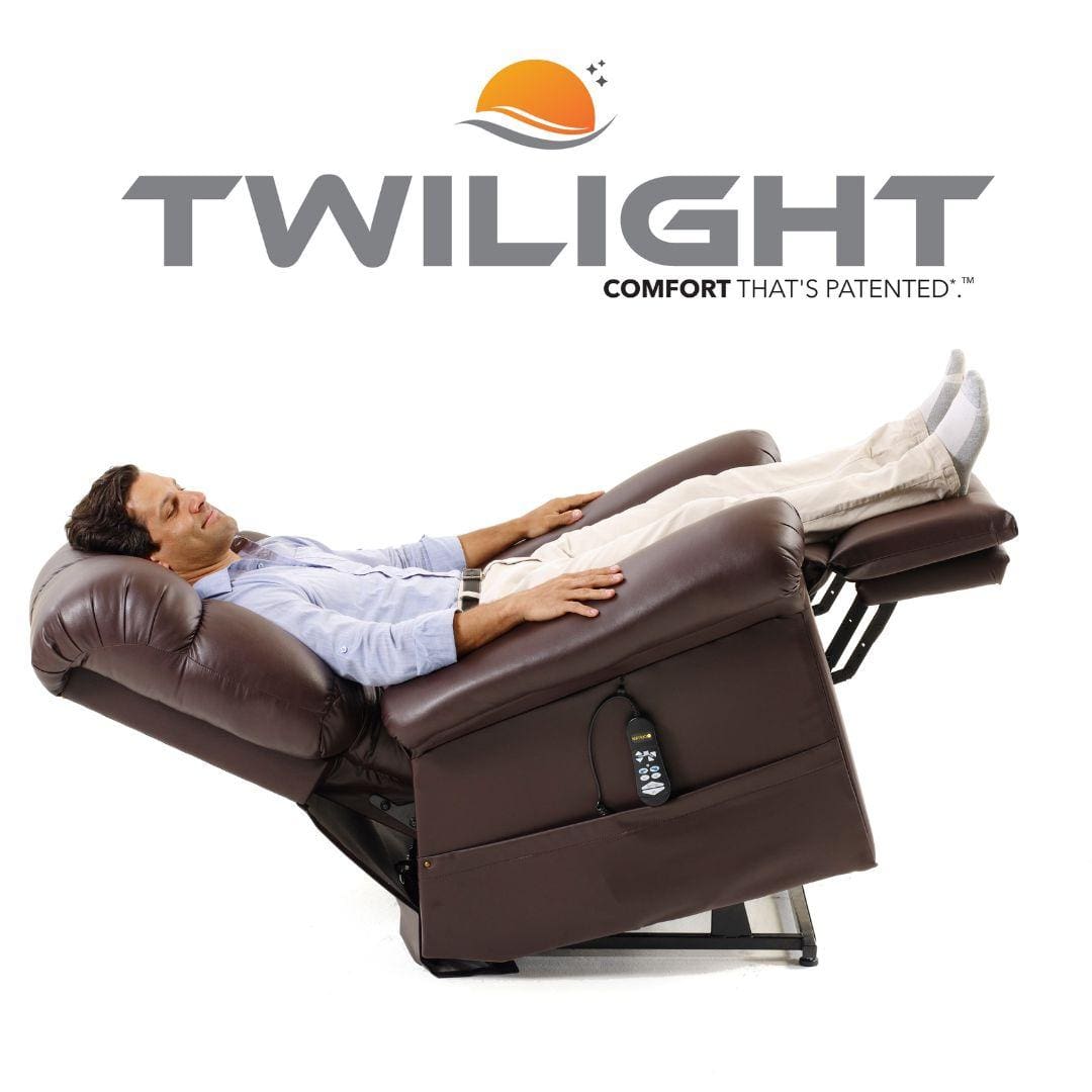 A man relaxes in the Cloud with Twilight Medium/Large Lift Chair by Golden Technologies, using the attached remote, beneath the Twilight comfort logo with a sun and wave graphic. A man relaxes in the Cloud with Twilight Medium/Large Lift Chair by Golden Technologies, using the attached remote, beneath the Twilight comfort logo with a sun and wave graphic.