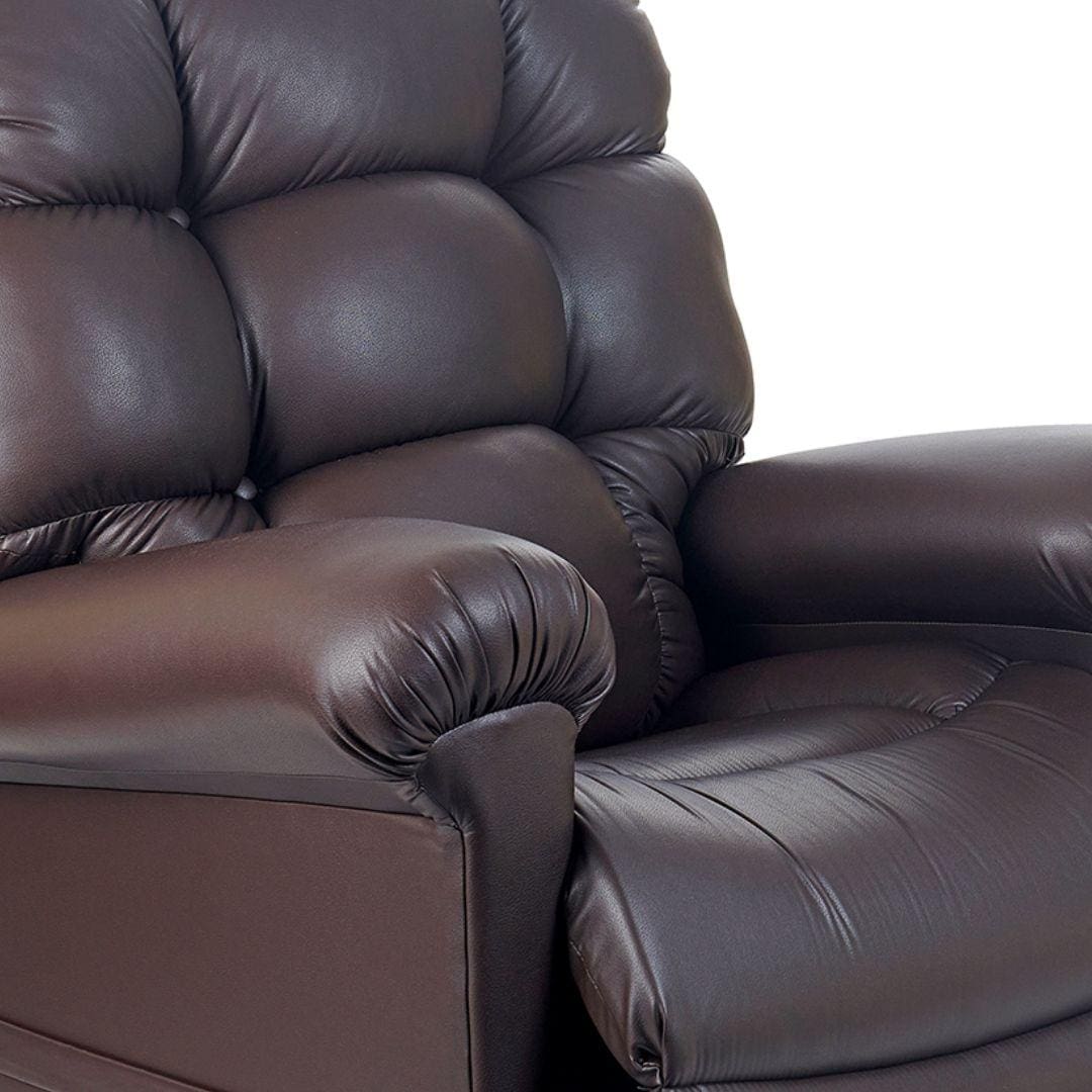 A close-up of the plush, dark brown Cloud with Twilight Medium/Large Lift Chair by Golden Technologies shows thick cushioned armrests, seat, and backrest against a plain white background. A close-up of the plush, dark brown Cloud with Twilight Medium/Large Lift Chair by Golden Technologies shows thick cushioned armrests, seat, and backrest against a plain white background.