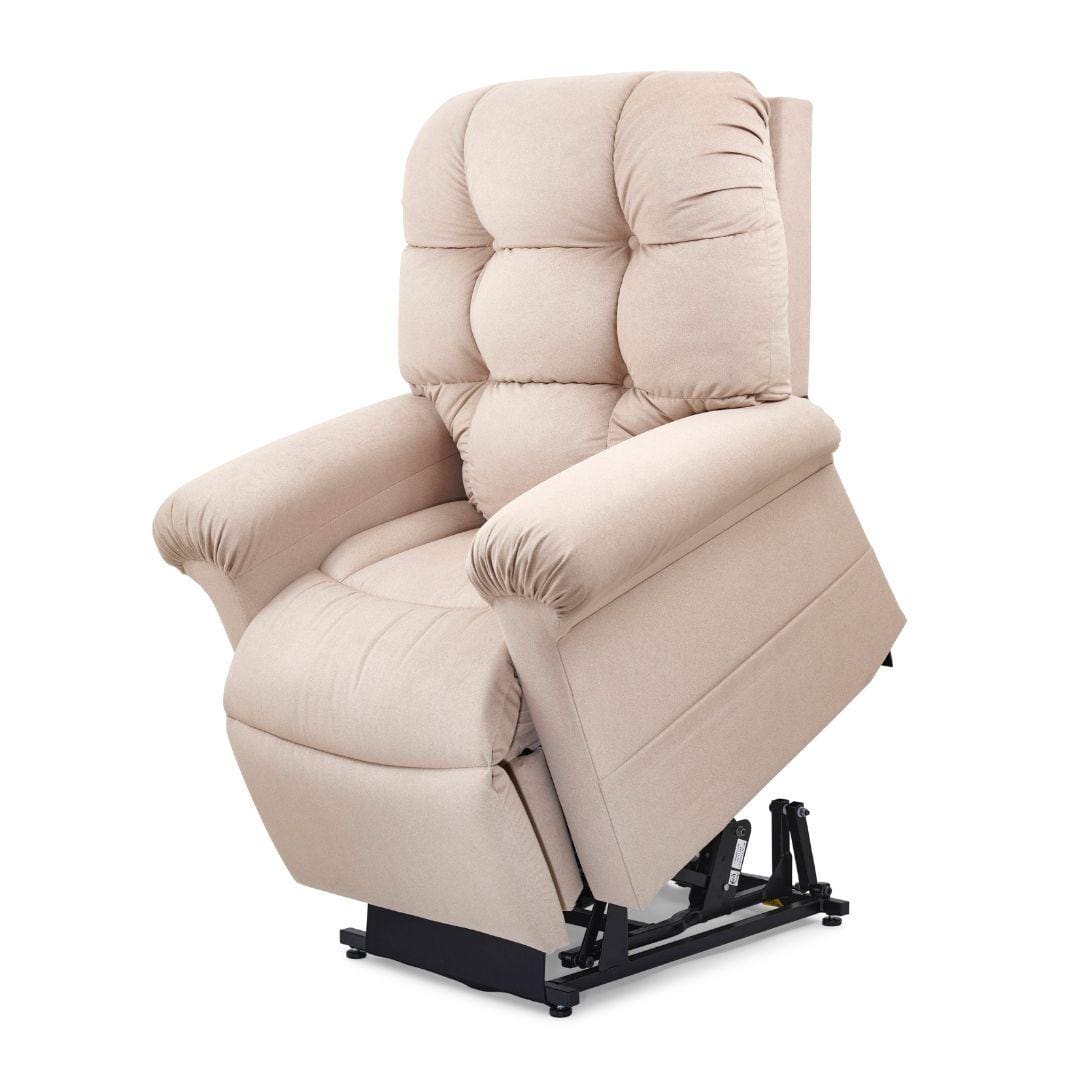 The Cloud with Twilight Small/Medium Lift Chair by Golden Technologies features beige upholstery, padded armrests and backrest, and a black mechanical base to assist users in standing up easily. The Cloud with Twilight Small/Medium Lift Chair by Golden Technologies features beige upholstery, padded armrests and backrest, and a black mechanical base to assist users in standing up easily.