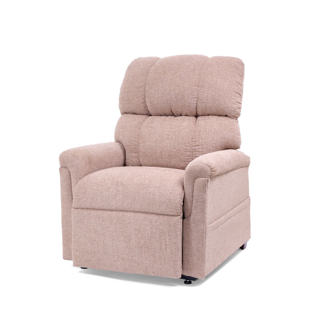 The Comforter Medium - Lift Chair by Golden Technologies is a plush, beige upholstered recliner with cushioned armrests and a high backrest, shown against a plain white background. The Comforter Medium - Lift Chair by Golden Technologies is a plush, beige upholstered recliner with cushioned armrests and a high backrest, shown against a plain white background.