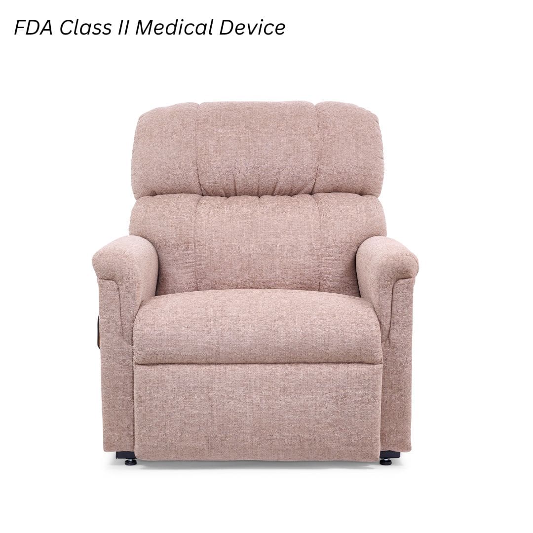 The Comforter Medium Wide - Lift Chair by Golden Technologies is a beige upholstered recliner with plush cushions. Shown against a white background, text above the chair reads “FDA Class II Medical Device.”. The Comforter Medium Wide - Lift Chair by Golden Technologies is a beige upholstered recliner with plush cushions. Shown against a white background, text above the chair reads “FDA Class II Medical Device.”.