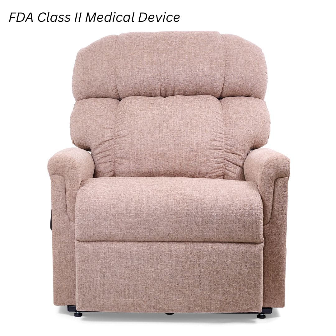 The Comforter Tall Wide Lift Chair by Golden Technologies, upholstered in beige with padded armrests and backrest, is labeled as an FDA Class II Medical Device at the top left corner. The Comforter Tall Wide Lift Chair by Golden Technologies, upholstered in beige with padded armrests and backrest, is labeled as an FDA Class II Medical Device at the top left corner.