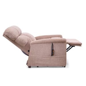 Side view of a beige Comforter Tall Wide - Lift Chair by Golden Technologies, fully reclined with extended footrest and remote control attached to the side.