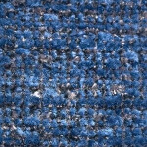 Close-up of a textured blue carpet with mixed fibers, adding comfort and style to any room—perfect beneath the Cloud with Twilight & Optional Nirvana Small/Medium Lift Chair by Golden Technologies for a cozy touch.