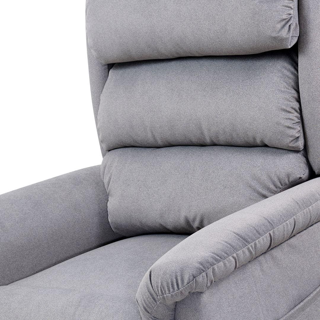 Close-up of the Relaxer Small - Lift Chair by Golden Technologies in plush light gray, featuring a padded armrest and three thick, horizontal backrest cushions. The soft fabric and supportive adjustable cushions provide exceptional comfort. Close-up of the Relaxer Small - Lift Chair by Golden Technologies in plush light gray, featuring a padded armrest and three thick, horizontal backrest cushions. The soft fabric and supportive adjustable cushions provide exceptional comfort.