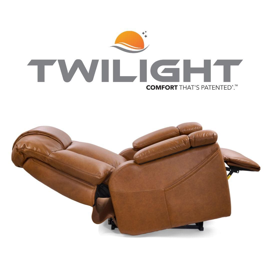 A Rhea with Twilight & Nirvana Medium Lift Chair by Golden Technologies, fully extended beneath the TWILIGHT logo featuring an orange sun and the slogan “Comfort that’s patented.”. A Rhea with Twilight & Nirvana Medium Lift Chair by Golden Technologies, fully extended beneath the TWILIGHT logo featuring an orange sun and the slogan “Comfort that’s patented.”.