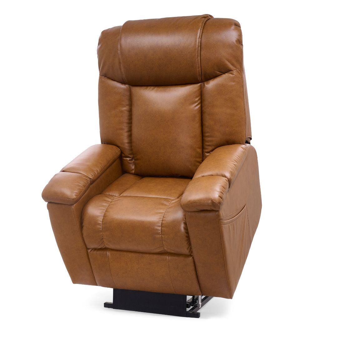 The Rhea with Twilight & Nirvana Medium Lift Chair by Golden Technologies features brown leather upholstery, padded armrests, a cushioned backrest, and a sturdy metal base, shown facing forward against a plain white background. The Rhea with Twilight & Nirvana Medium Lift Chair by Golden Technologies features brown leather upholstery, padded armrests, a cushioned backrest, and a sturdy metal base, shown facing forward against a plain white background.