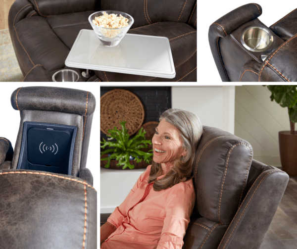 A woman smiles while reclining in the Titan Medium - Lift Chair by Golden Technologies, featuring a popcorn tray, built-in cup holder, and a wireless charging pad in the armrest.