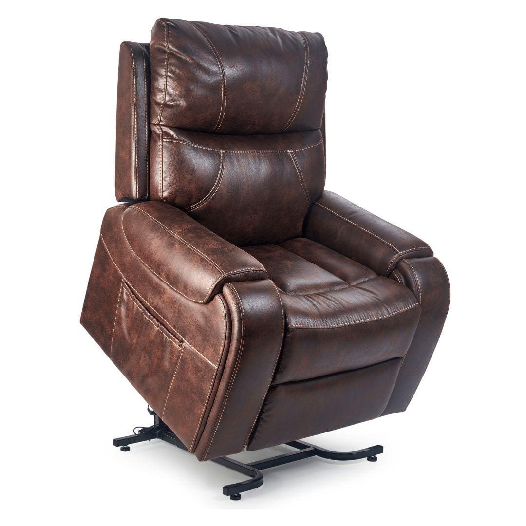 The Titan Medium - Lift Chair by Golden Technologies is a brown leather recliner with visible stitching and a black metal base, designed to assist seniors in standing up with ease. The Titan Medium - Lift Chair by Golden Technologies is a brown leather recliner with visible stitching and a black metal base, designed to assist seniors in standing up with ease.
