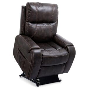 The Titan with Twilight Medium - Lift Chair by Golden Technologies is a dark brown recliner featuring visible stitching, padded armrests, and a slightly elevated base, designed for comfort and support.