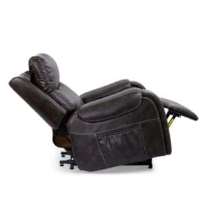 The Titan with Twilight Medium - Lift Chair by Golden Technologies is a dark brown leather chair with visible stitching, padded cushions, an extended footrest when reclined, and a side pocket for storage.