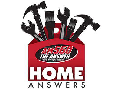 A red toolbox filled with tools such as hammers, paintbrushes, and wrenches. The toolbox features the AM560 The Answer logo. Below it, bold text reads HOME ANSWERS.
