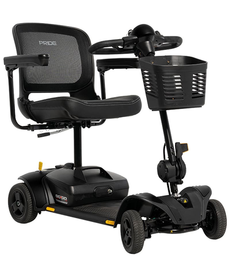 The Go Go Elite Traveller 2 Platinum 4-Wheel Scooter by Pride Mobility is a black, heavy-duty mobility scooter with a mesh backrest, armrests, front basket, and control handlebars—ideal for seniors needing comfort and support.