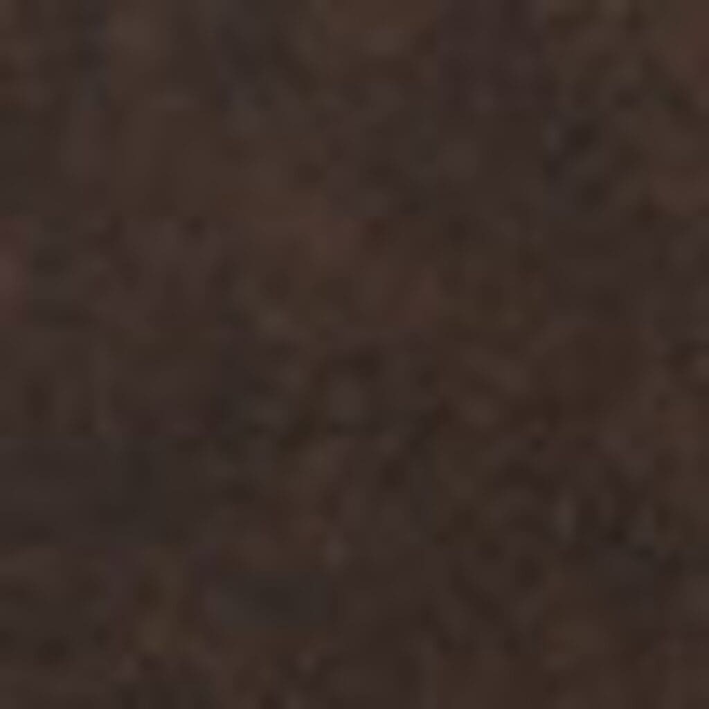 A close-up image displays the dark brown, textured surface with a speckled appearance featured on the VivaLift Radiance PLR-3955 Lift Chair by Pride Mobility, designed for added comfort and style.