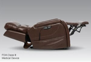The VivaLift Premier PLR-5900 by Pride Mobility is a brown reclining lift chair, perfect for seniors as an Electric Lift Chair Home solution. Fully reclined with an elevated leg rest. FDA Class II Medical Device text appears on a plain gray background.