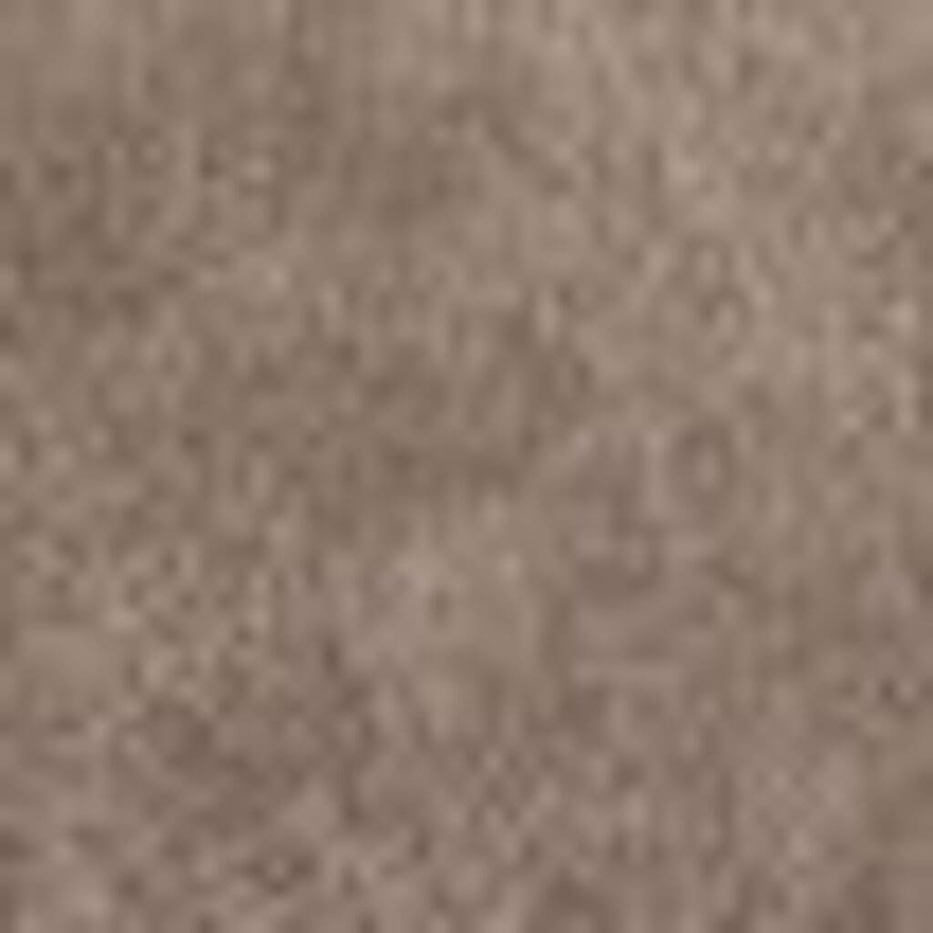 Close-up of a textured brown surface, possibly fabric from the VivaLift Tranquil 2 - PLR-935- Lift Chair by Pride Mobility, featuring a slightly mottled appearance.
