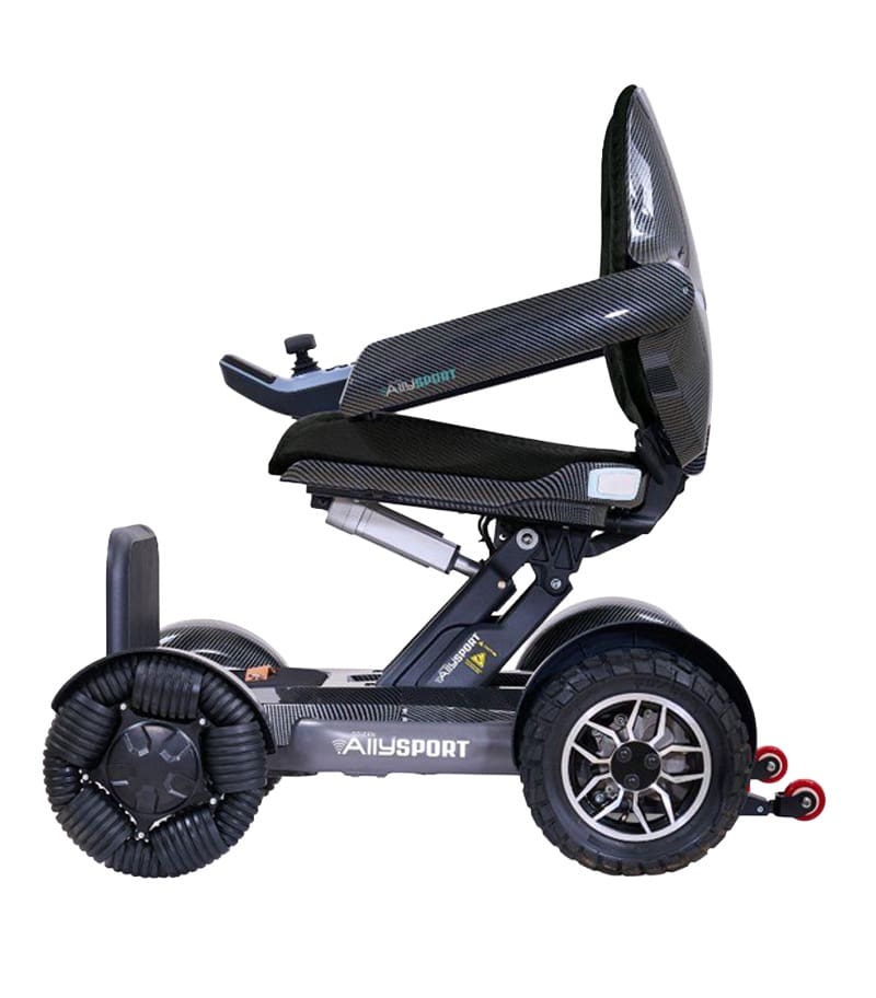 Side view of the Ally Sport - Power Wheelchair by Golden with a carbon fiber frame, large rugged rear wheels, small omni front wheels, and elevated seat—lightweight and portable for travel. Side view of the Ally Sport - Power Wheelchair by Golden with a carbon fiber frame, large rugged rear wheels, small omni front wheels, and elevated seat—lightweight and portable for travel.