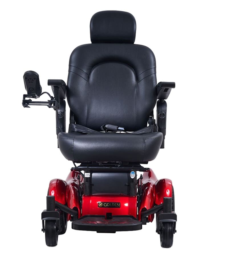 The Compass HD - Power Wheelchair by Golden in red features a padded black seat, adjustable armrests and headrest, and left-arm joystick control—delivering reliable, portable comfort for daily use.