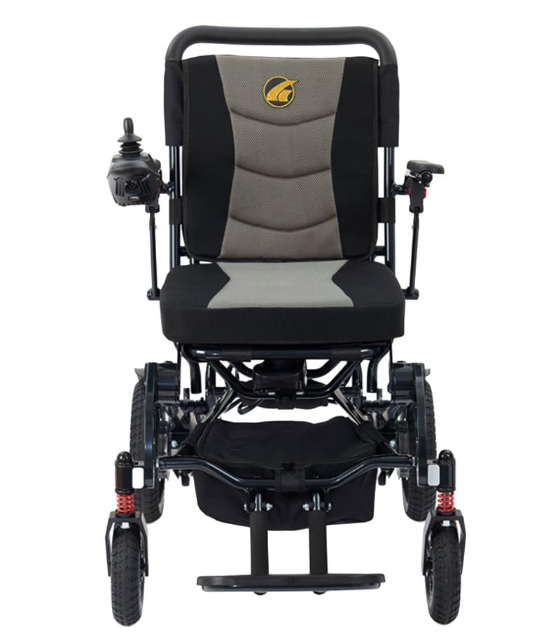The Stride - Power Wheelchair by Golden in black and gray features armrests, a right-side joystick controller, footrest platform, and padded backrest—an ideal portable power wheelchair for seniors, shown from the front. The Stride - Power Wheelchair by Golden in black and gray features armrests, a right-side joystick controller, footrest platform, and padded backrest—an ideal portable power wheelchair for seniors, shown from the front.