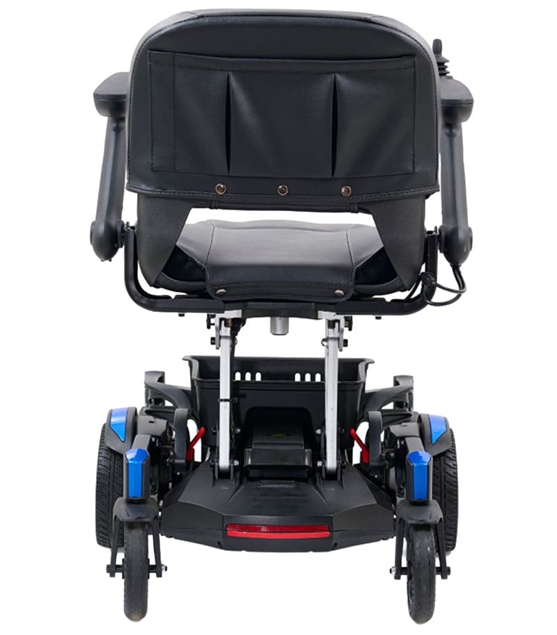 Rear view of the Buzzaround CarryOn Power Wheelchair by Golden in black, featuring a padded seat and backrest, dual armrests, large rear wheels with blue-accented covers, and smaller front wheels. Rear view of the Buzzaround CarryOn Power Wheelchair by Golden in black, featuring a padded seat and backrest, dual armrests, large rear wheels with blue-accented covers, and smaller front wheels.