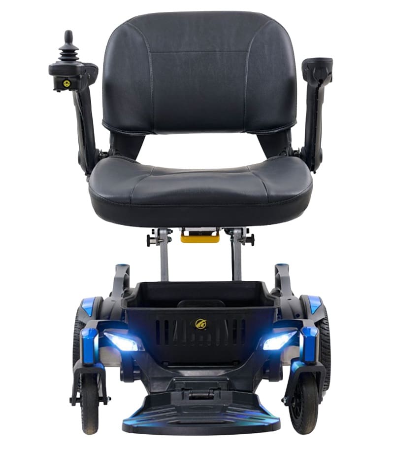 Front view of a black and blue Buzzaround CarryOn - Power Wheelchair by Golden, featuring armrests, a padded seat, left-arm joystick control, and two front wheels. The travel wheelchair arrives partially assembled. Front view of a black and blue Buzzaround CarryOn - Power Wheelchair by Golden, featuring armrests, a padded seat, left-arm joystick control, and two front wheels. The travel wheelchair arrives partially assembled.