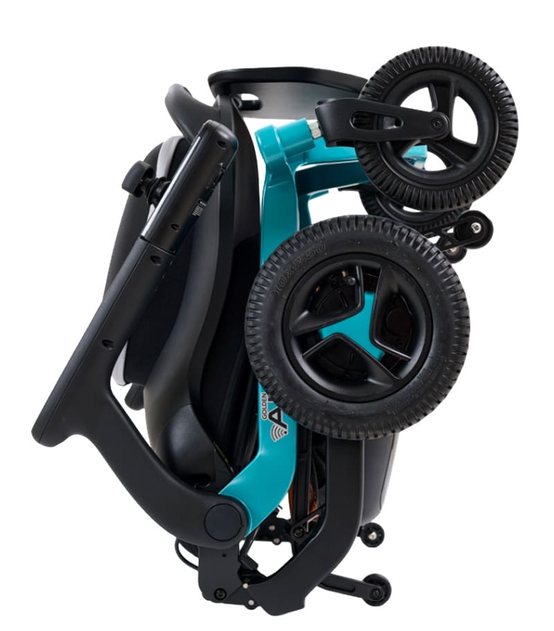 The Ally - Power Wheelchair by Golden features a compact, foldable teal frame with large black wheels, offering easy portability and transport—perfect for seniors seeking mobility on the go. The Ally - Power Wheelchair by Golden features a compact, foldable teal frame with large black wheels, offering easy portability and transport—perfect for seniors seeking mobility on the go.