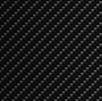 A black background with diagonal rows of small, evenly spaced gray dots forms a repeating pattern—perfect for highlighting the Jazzy Carbon 27X Power Wheelchair by Pride Mobility or showcasing your favorite travel wheelchair design.