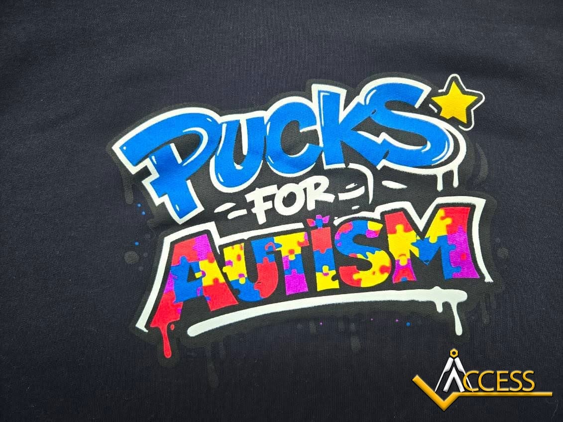 Giving Back Through Community: Access Elevator Supports Pucks for Autism Championship