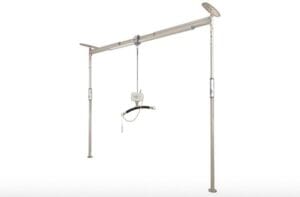 The Easy Fit 440 Gantry by Mackworth is a ceiling-mounted patient lift system with two vertical poles, a horizontal track, and a motorized sling for safe lifting and transfers—perfect for boosting mobility in home care environments.