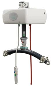 The Fixed Ceiling Lift by Mackworth is a ceiling-mounted, motorized overhead lift featuring a curved support bar, red and gray straps, and a handheld control for safe and efficient patient transfers.