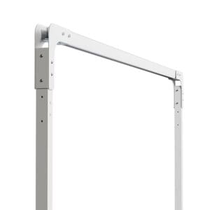 A close-up of the SteadyTrack Patient Lift System by Mackworth shows its white metal rectangular frame with bolted joints, likely part of an overhead lift, set against a plain white background.