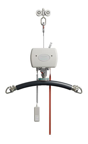 The Portable Ceiling Lift System by Mackworth features a curved padded bar, dual metal hooks, control unit, suspension cables, and handheld remote for convenient patient operation. The Portable Ceiling Lift System by Mackworth features a curved padded bar, dual metal hooks, control unit, suspension cables, and handheld remote for convenient patient operation.