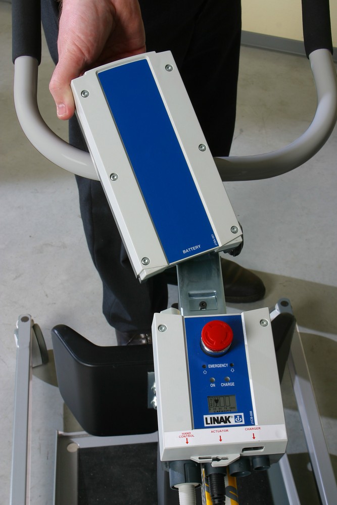 Removable and exchangeable battery holder with charger
